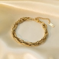 Golden woven multi-link stainless steel bracelet with lobster clasp on silk - E2055 Red Cliff Style Gold Bracelet
