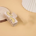 Beige western style hair claw clip featuring yellow sunflower pattern on wooden plate - Beige / Sunflower