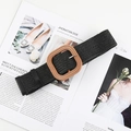 Detail of black woven straw belt with square wood buckle on a fashion magazine - Square Buckle Black