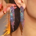Close-up of sparkling colorful rhinestone fringe earrings with long luxury tassels - Flat Style / Color Rhinestone Flat