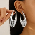 Polished silver U-shaped geometric wrinkled earrings with a shiny metallic mirror finish - Hollow Oval Geometric Style (6130) / Silver