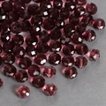 Macro view of multifaceted purple crystal beads with high-shine aurora plating for DIY jewelry - 4mm Rondelle Beads 170pcs/Pack / Medium Purple