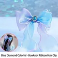 Blue and purple gradient bow hair clip with organza streamers and a blue gemstone - Blue Gem Streamer Hair Clip (A190-12)
