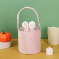 Detailed view of pink velvet Easter bunny ear basket with soft texture and handle - Light Pink