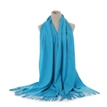 Solid bright blue faux cashmere scarf with tassels, draped on a mannequin - Sky Blue