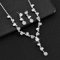 Detail of silver bridal jewelry set featuring a shimmering crystal necklace and earrings - Silver White Rhinestone (Necklace And Earrings)