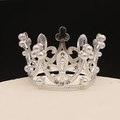 Silver crown cake topper with white pearls and sparkling rhinestones on black background - Mini Silver With Rhinestone