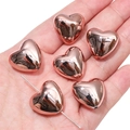 Rose gold heart-shaped acrylic beads shown on a palm for DIY jewelry making - Polished Heart Style / 20x18mm (4 Pieces/Pack) / Pink