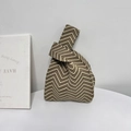Knit tote bag with brown and beige zigzag pattern in a stylish knot design - Wave Coffee
