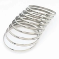 Set of minimalist polished silver stackable stainless steel bangles for women - Inner Diameter 55mm / Steel Color (9 Rings)