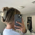 Elegant matte cream marble hair claw clip for women styled in a chic hair bun - White