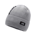 Light grey winter knit beanie with black label patch and thick ribbed texture - Light Gray