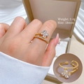 Detail showing clover ring dimensions with 2.4g weight and 18mm size on silk fabric - Adjustable Open / Gold