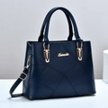 Dark blue PU leather handbag with geometric stitching and detachable shoulder strap - Blue