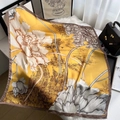 Detail of yellow silk scarf with white floral patterns and vintage sketch motifs - Style 11