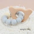 Baby teething bracelet with grey and beige silicone beads and a wooden bunny charm - Round/Gray Beads