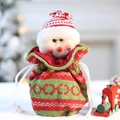 Knitted Christmas drawstring gift bag featuring a cute 3D snowman with a red knit hat - Snowman