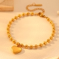 Elegant gold beaded stainless steel bracelet featuring a romantic heart charm and extender - Heart Bead Anklet