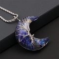 Macro detail of crescent moon pendant with blue gravel stones and wire wrapped tree of life - Lapis Lazuli Moon - Silver Twist Chain
