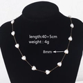 Detail view of heart pearl necklace on mannequin showing 40+5cm length and 8mm bead size - Heart Pearl Necklace (8mm)