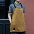 Khaki canvas work apron with adjustable straps and multiple utility pockets - Short Workwear Apron / Orange
