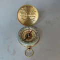 Vintage brass flip compass for son with dad's engraved message on marble background - From Dad to Son