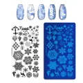Macro detail of Manzilin-01 Christmas snowflake nail stamping plate with design examples - Christmas Style 01 (MANZILIN-01)