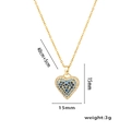 Detail view of heart pendant with blue stones, measuring 15mm with a 45cm chain length - Blue Rhinestone Heart Necklace Gold