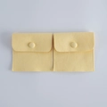 Light yellow velvet jewelry pouches with snap button closure for ring storage - Yellow