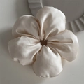 Detail of cream silk satin scrunchie featuring a large 3D flower shape and soft texture - Five-Petal Scrunchie - Cream White (Standard)