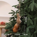 Hanging squirrel Christmas ornament with fluffy tail and pine cone on a branch - Climbing Squirrel Stick Medium