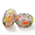 Two transparent fruit-inspired resin charms with colorful confetti and silver cores - Colorful Confetti