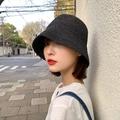 Women's black woven straw sun hat in a classic fisherman style for summer beach wear - One Size / Solid Color Bucket Hat - Black