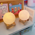 Creative moon lamp with wooden base glowing in warm yellow light for home decor - Moon Lamp 8cm with Stand