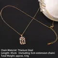 Gold plated titanium steel necklace featuring a cross pendant with colorful zircon stones - Cross No.33 Gold (A1211)