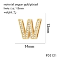 Detailed macro view of gold-plated letter W pendant with sparkling cubic zirconia stones - Letter W