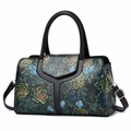 Detailed view of textured floral embossed leather with golden hardware on a pillow handbag - Dark Green Cyan Floral Style 1