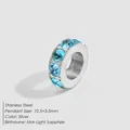Polished silver stainless steel spacer bead set with sparkling light sapphire blue crystals - March Light Blue (MAR-LIGHT SAPPHIRE) / 10.5x3.5mm / Silver