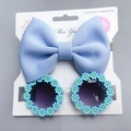 Detail of light blue bow headband and daisy flower sunglasses set for toddlers - Blue