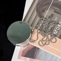 Mini borsa rotonda in acrilico con finitura a specchio argento e catena in metallo - Argento