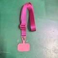 Pink crossbody phone lanyard with woven nylon strap, metal clip and matching tether tab - Burgundy