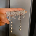 U-shaped earrings featuring a sparkling rhinestone bow and long crystal tassels in silver - Silver Bowknot Tassel (Silver Earring Post)