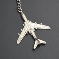 Silver metal H-6K aircraft bomber keychain model with sleek polished finish - Silver H-6K Bomber Jet