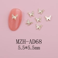 Detailed view of 5.5mm gold butterfly metal charms for 3D nail art decoration - Gold Carved Butterfly (AD68)