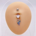Detailed shot of silver belly ring with large white zircon and rainbow winged pendant - Wing Shape (JE079)