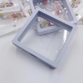 Square light blue floating jewelry frame for flower bracelets with transparent PE film - Jewelry Box