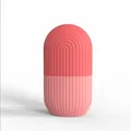 Pink silicone face ice roller mold with non-slip texture and dual-tone capsule design - Wave Texture Pink