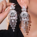 Exaggerated silver drop earrings with long rhinestone tassels on female model - Dangle Tassel (BXE055PL-W) / Silver
