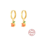 Detail of 925 sterling silver gold hoop earrings with orange fruit shaped zircon pendants - Gold-Orange