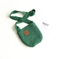 Borsa a tracolla in maglia verde con trama intrecciata e toppa decorativa in pelle - Verde